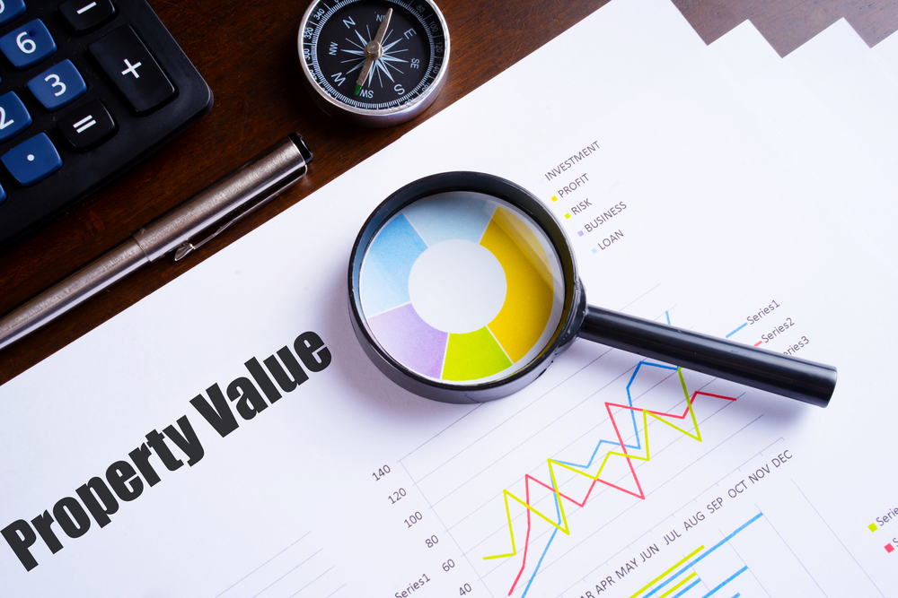 property value with graph and magnifying glass