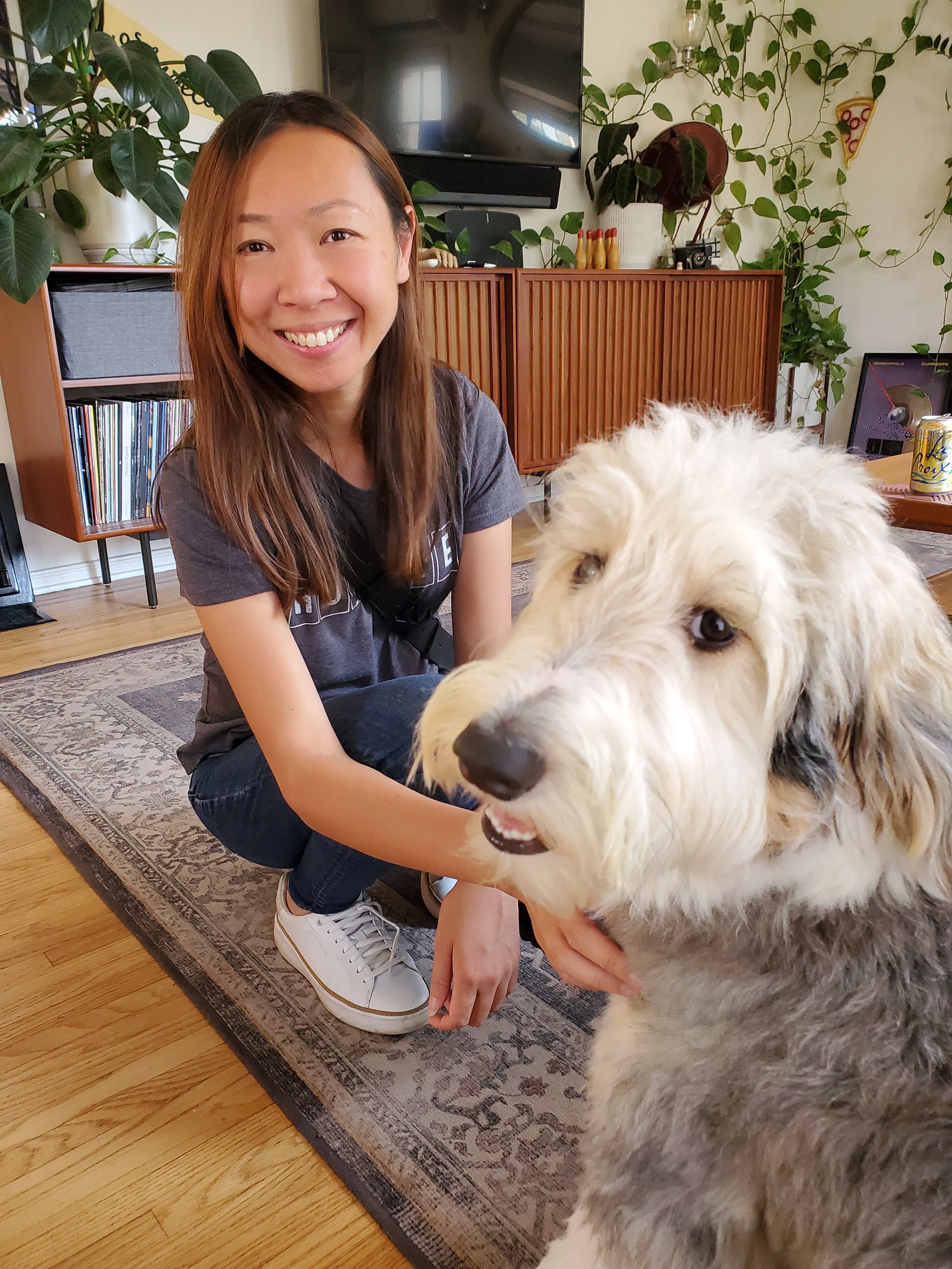 cindy playing with seller's dog