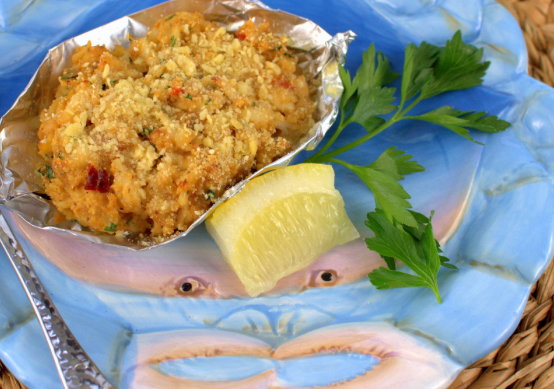 Elegant plated Gulf Coast seafood dish in a refined dining setting
