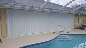 Protecting Your Home: Hurricane Shutters vs. Impact Windows - A realtor's Perspective