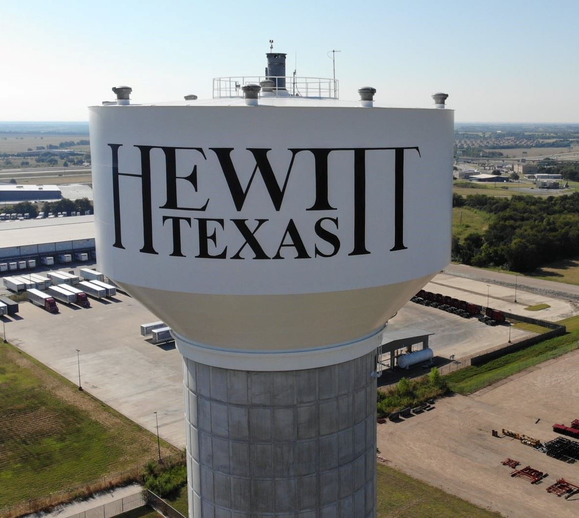 Arieal photo of Hewitt Texas Water tower that says Hewitt Texas on the side of it