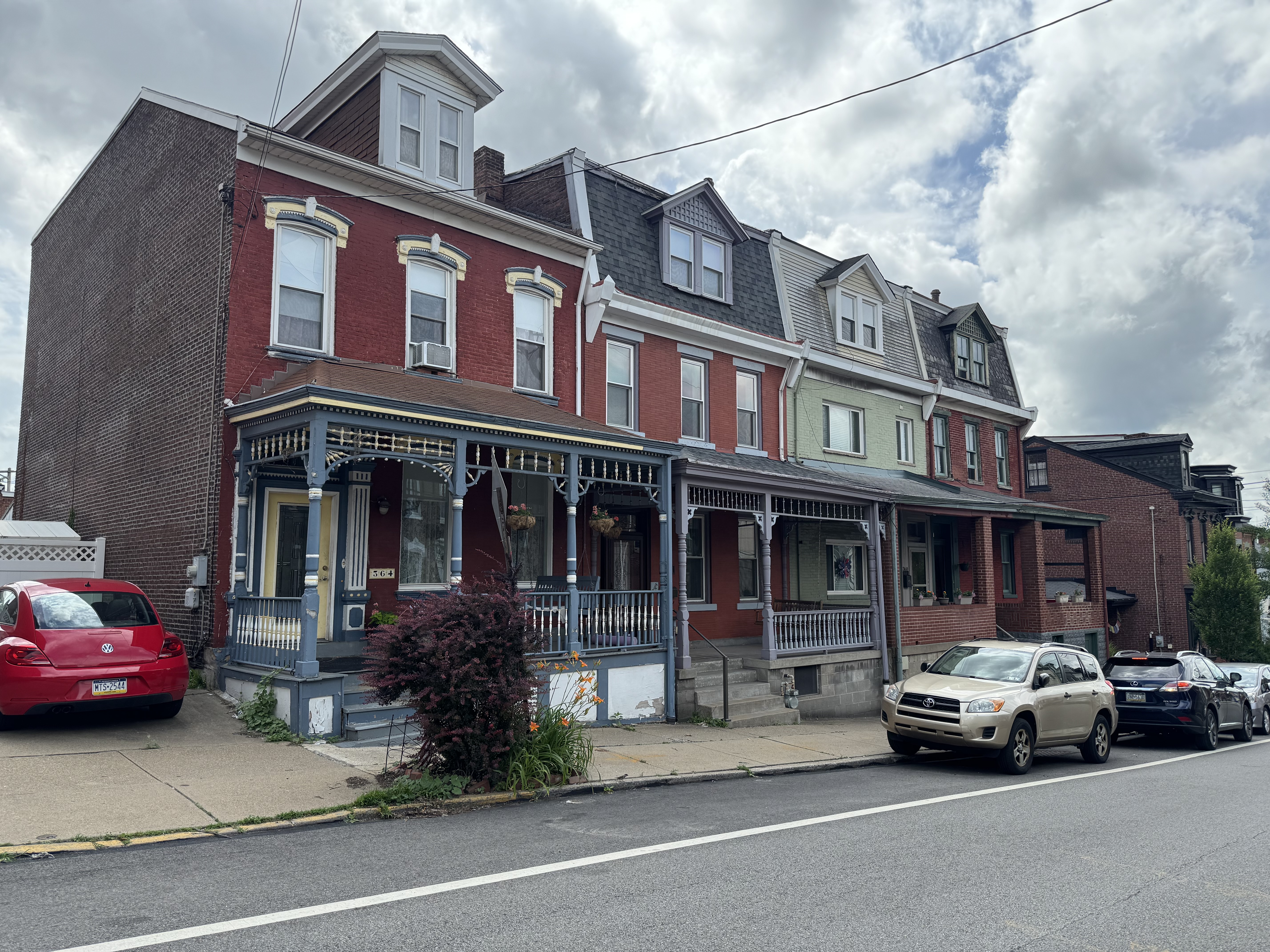 Brick rowhouses on a classic Lawrenceville street. Brick rowhouses in Lawrenceville Pittsburgh real estate market