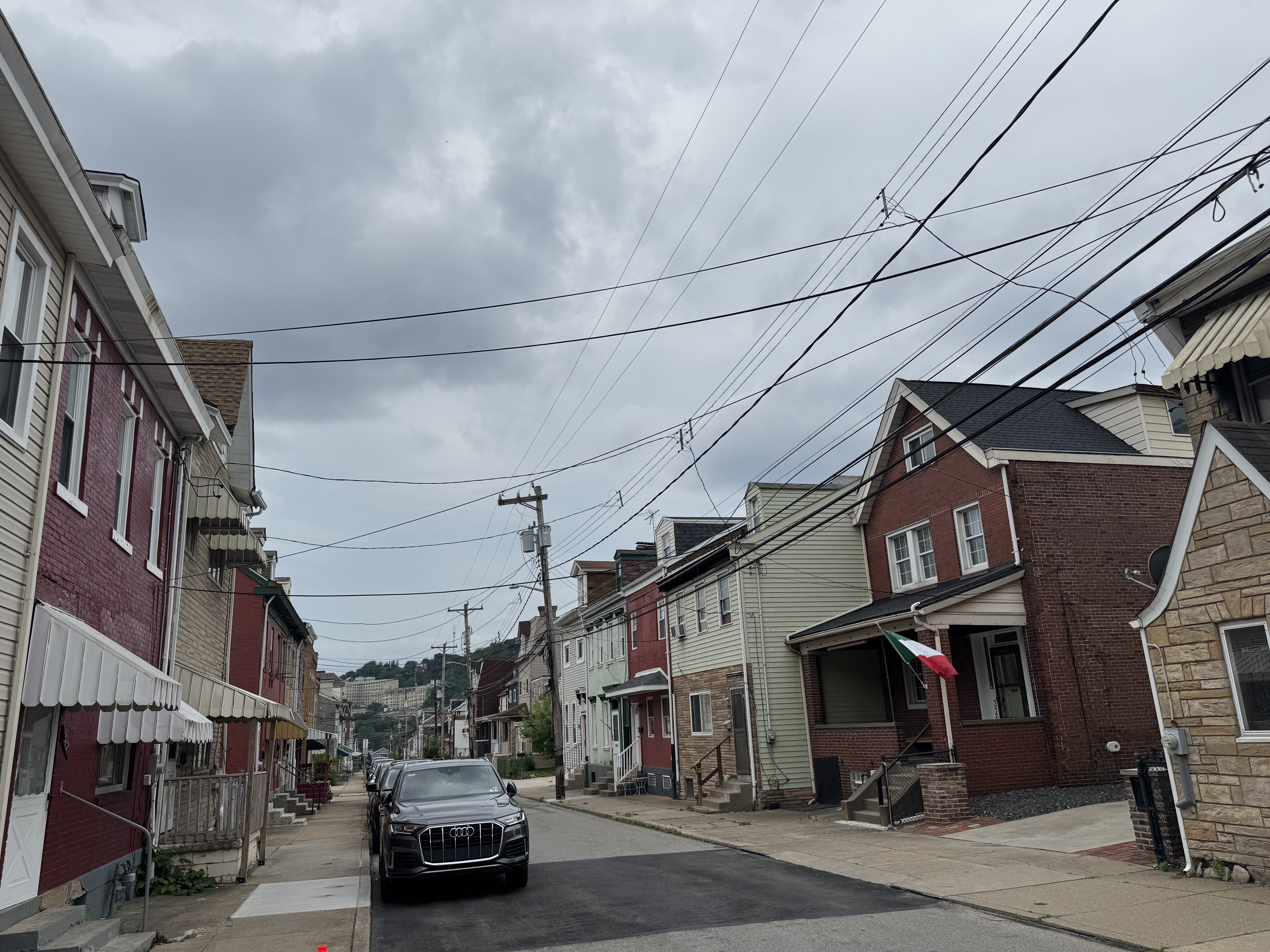 Classic brick rowhouses line Bloomfield's residential side streets. Rowhouses and porch-front homes in Bloomfield Pittsburgh