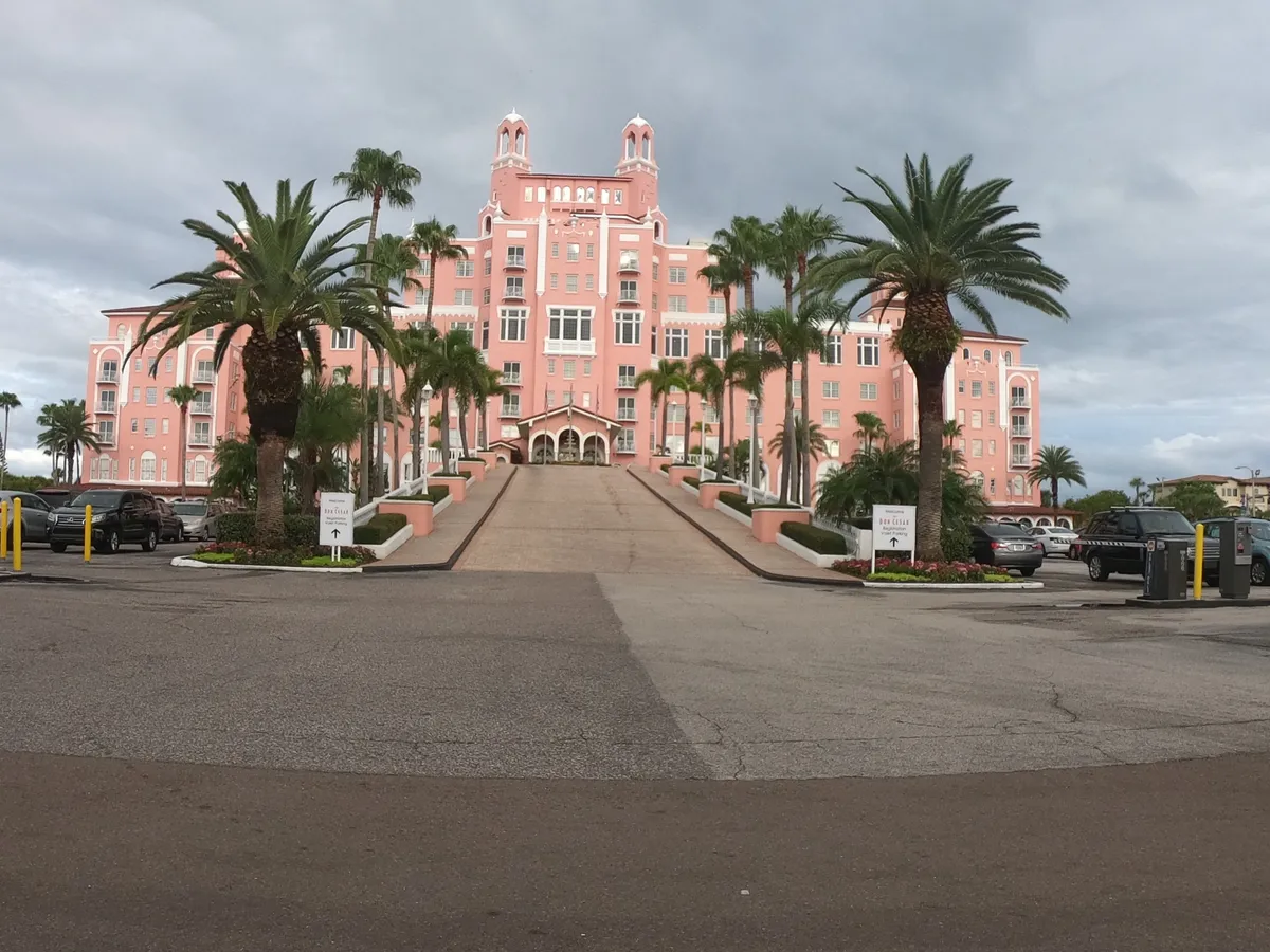 The Don CeSar Hotel in St. Pete Beach, Florida The iconic pink Don CeSar Hotel overlooking St. Pete Beach, Florida, framed by palm trees and the historic grand entrance