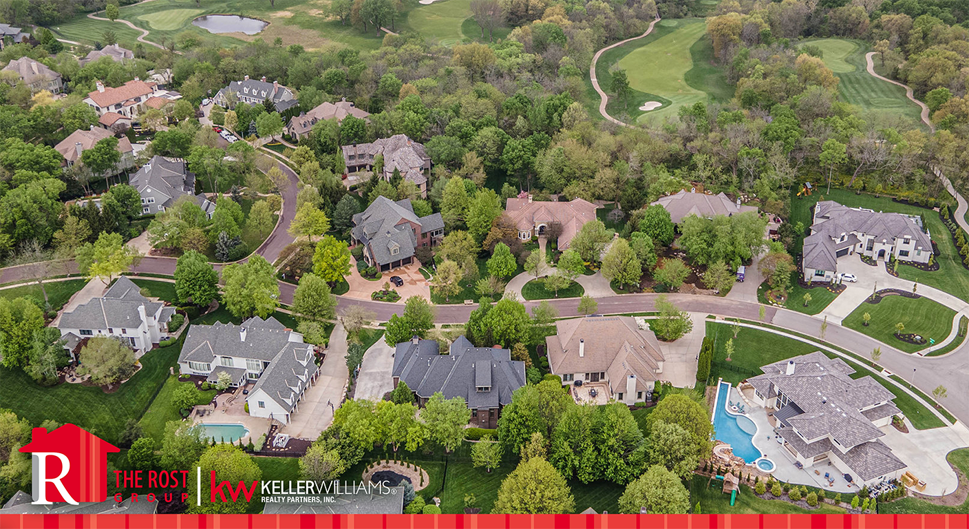 Aerial view of a luxury home in south Overland Park, Kansas, overlooking a golf course community