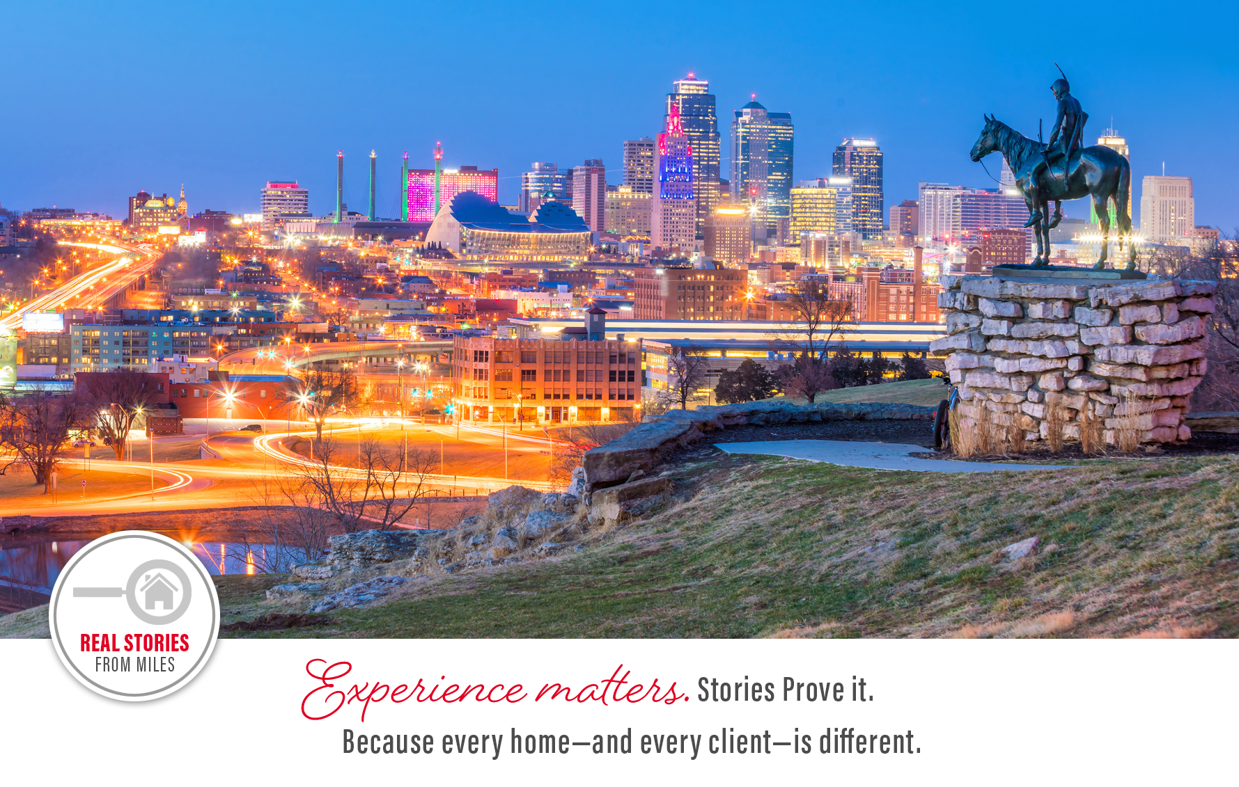 Kansas City skyline at night with The KC Scout statue overlooking downtown