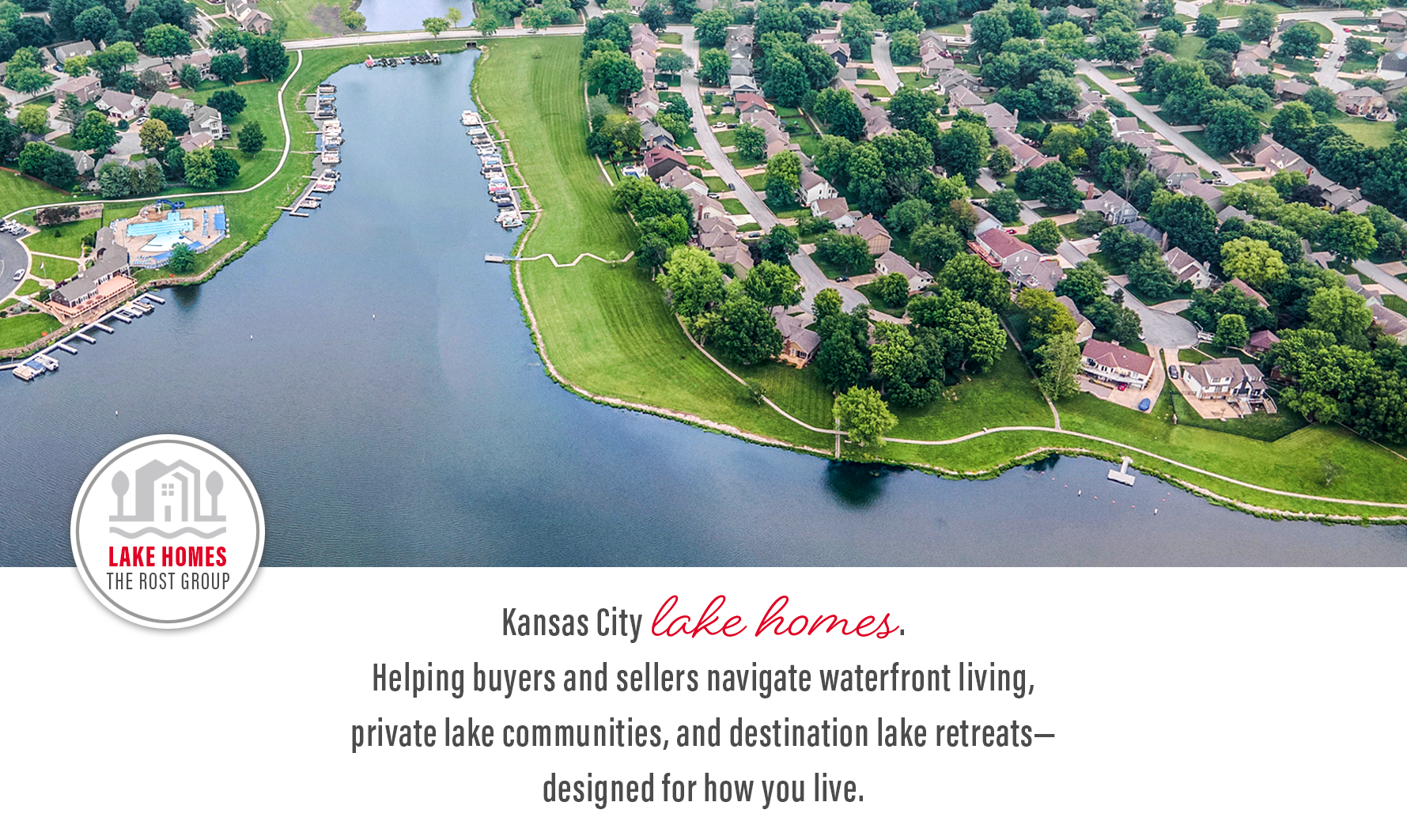 Aerial view of a Kansas City–area lake neighborhood with lakefront homes, private docks, and community amenities