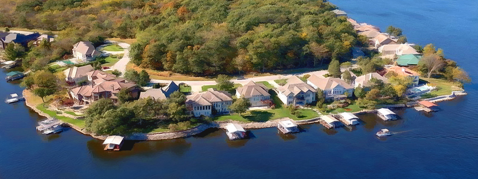 A view of homes and the water at luxury Lake Winnebago in the Kansas City metro area