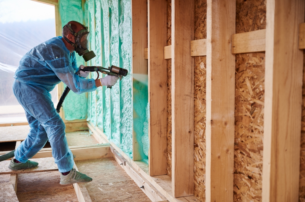 man spraying paint