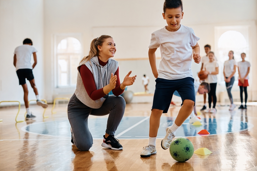 teacher and student learning football