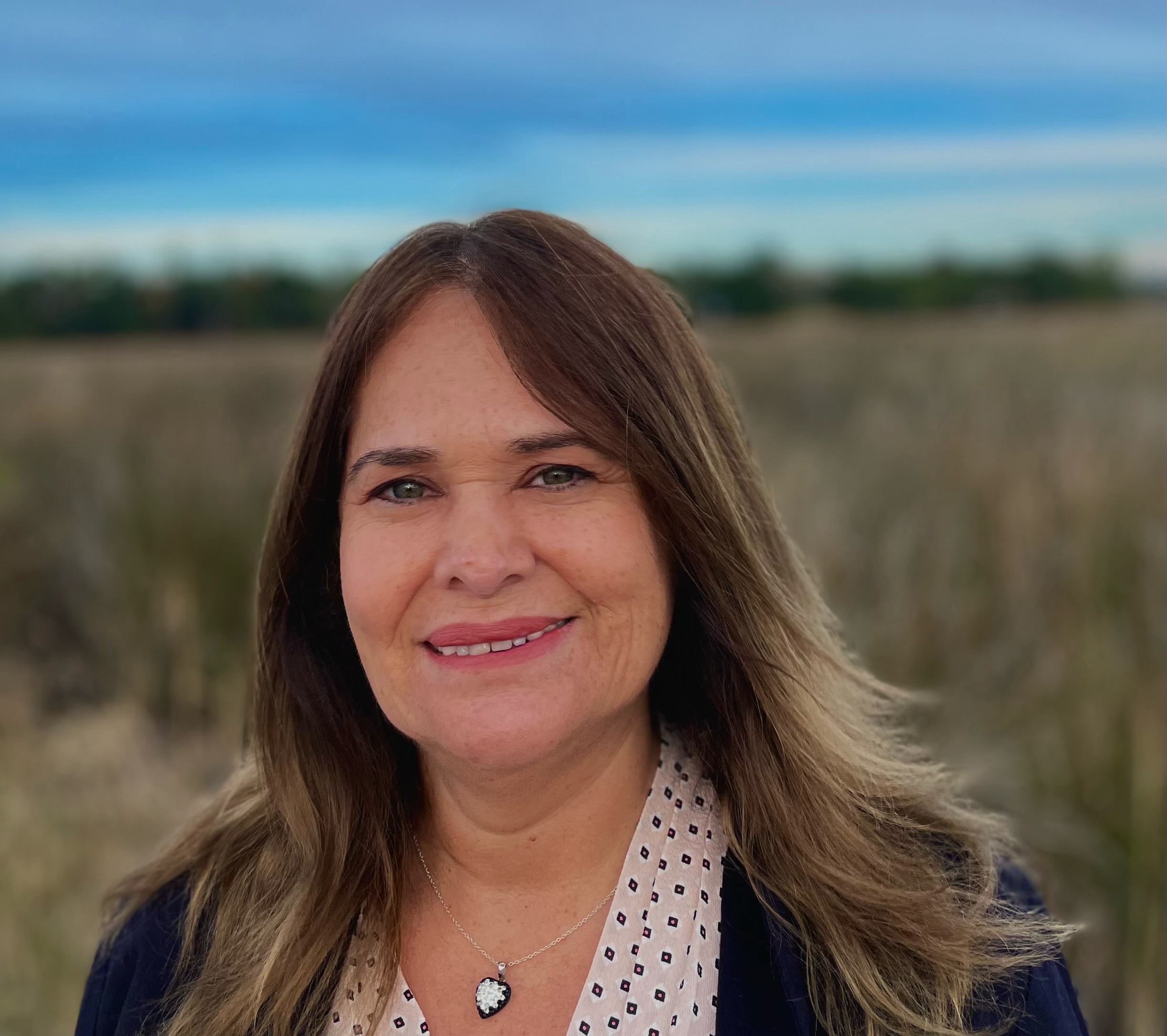      Maria (Charo) Velez de Villa   Broker/owner 