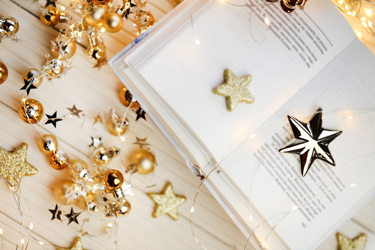 Open Book with Gold Garland & Stars