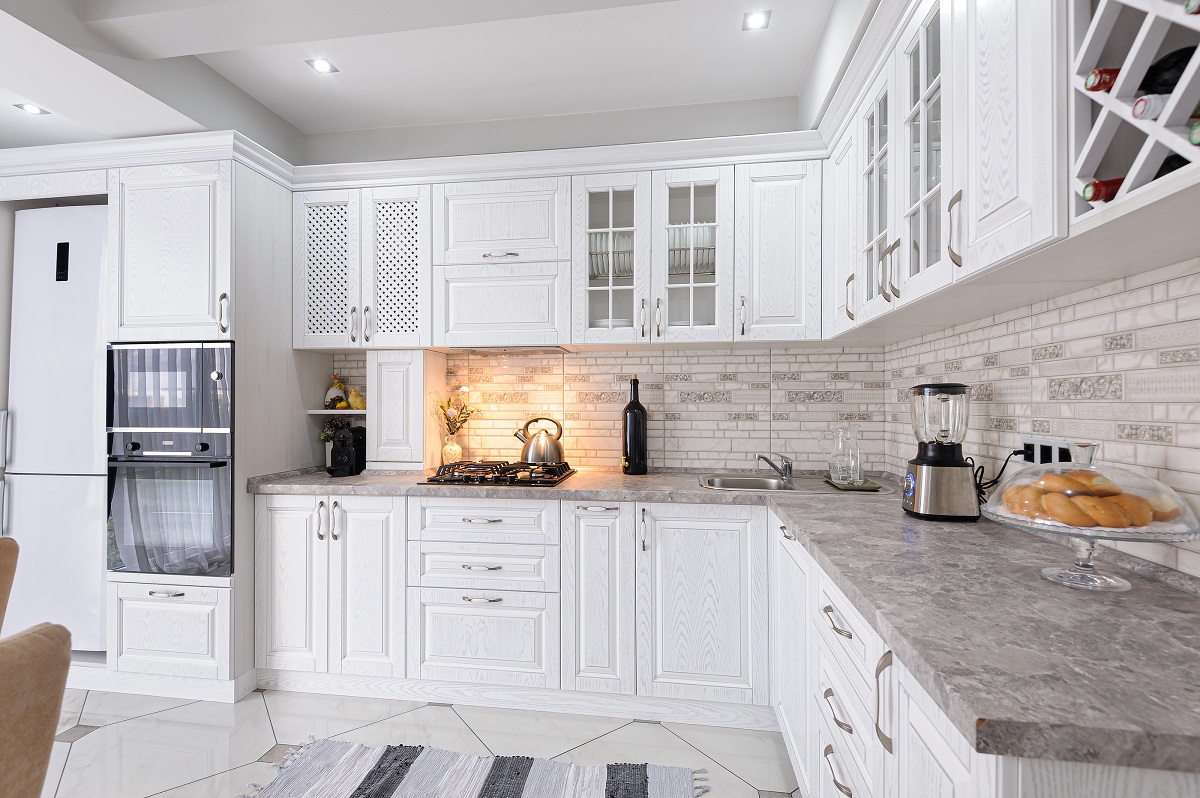 White Kitchen with Marble Counters