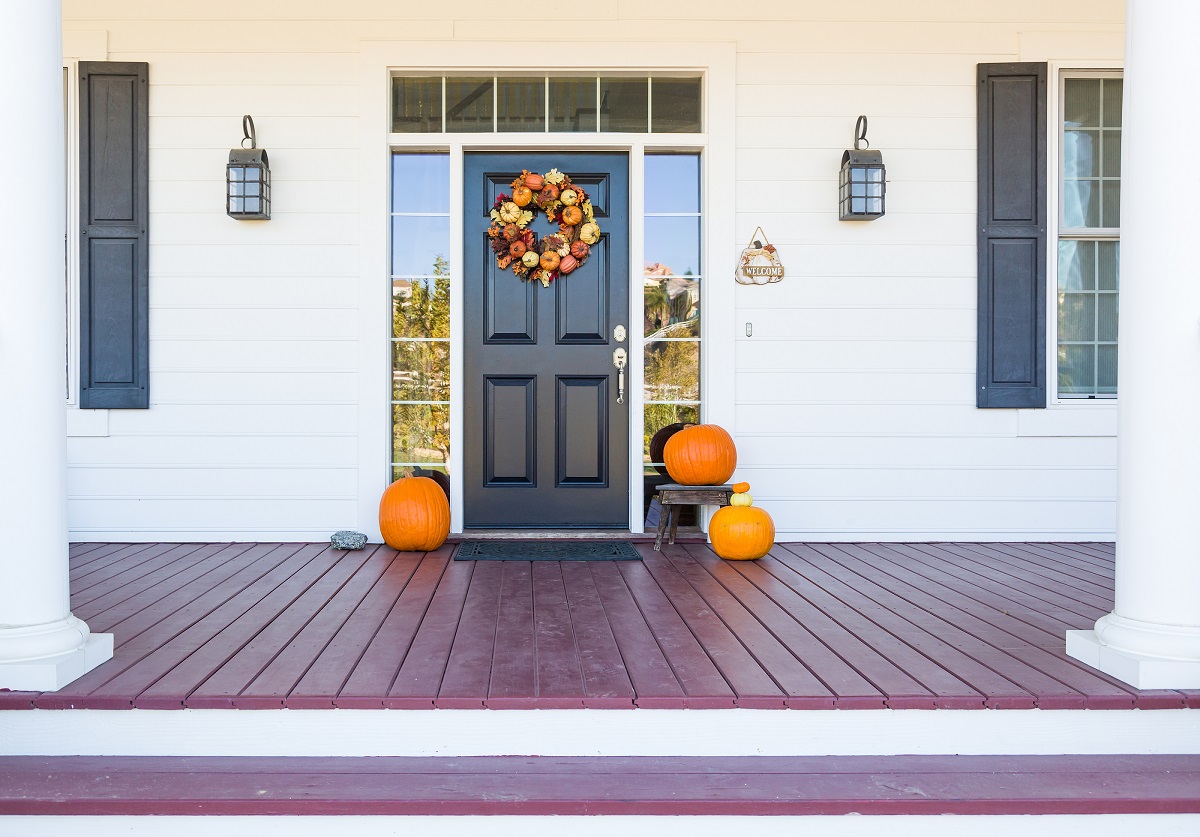 fall décor on house's front door