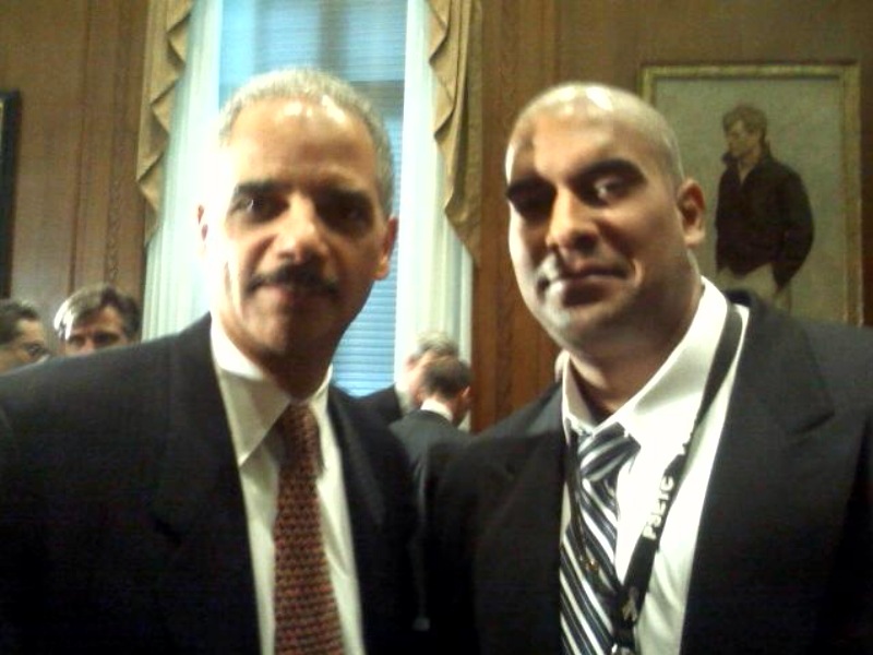 Omar K Mohammed and former United States Attorney General Eric Holder