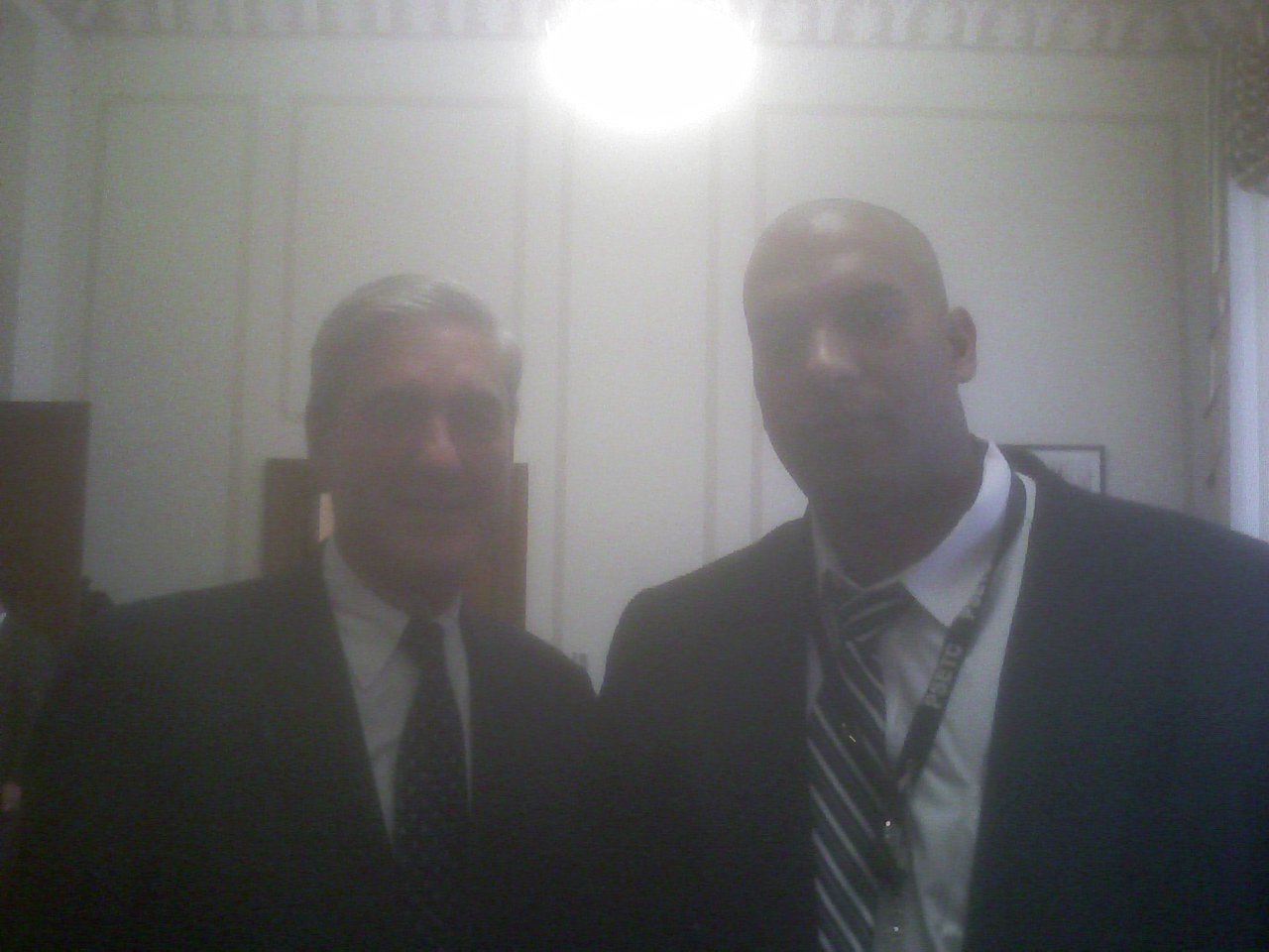 Omar K Mohammed and former FBI Director Robert S. Mueller, III