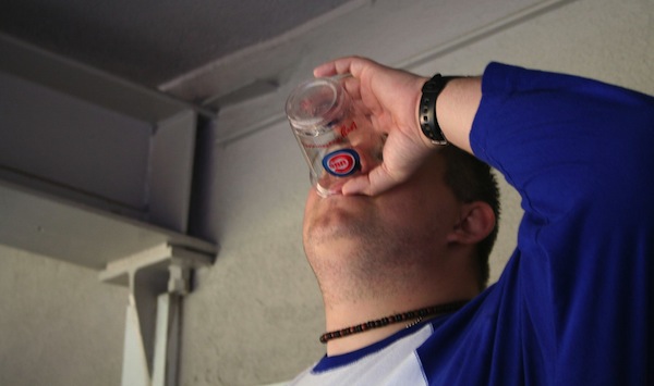Cubs fan drinking beer
