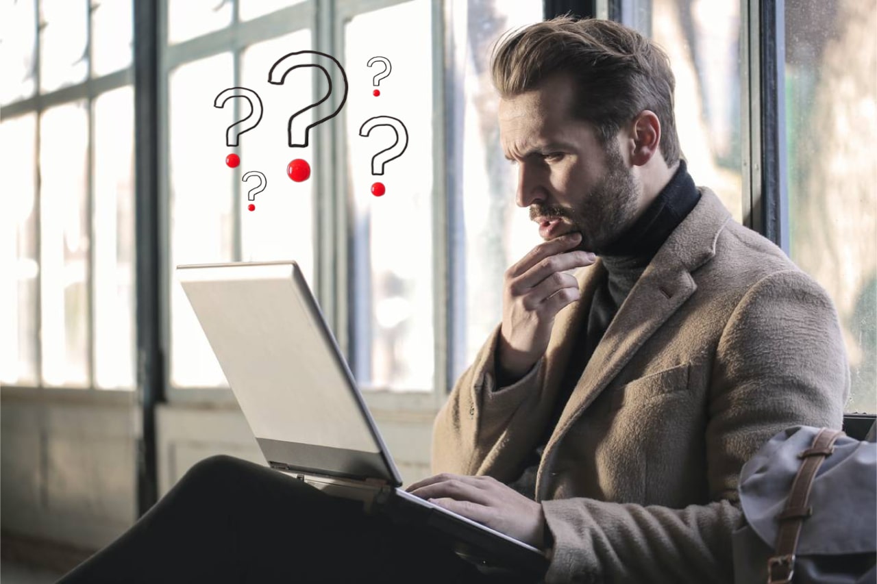 man looking at his laptop confused with questions about real estate