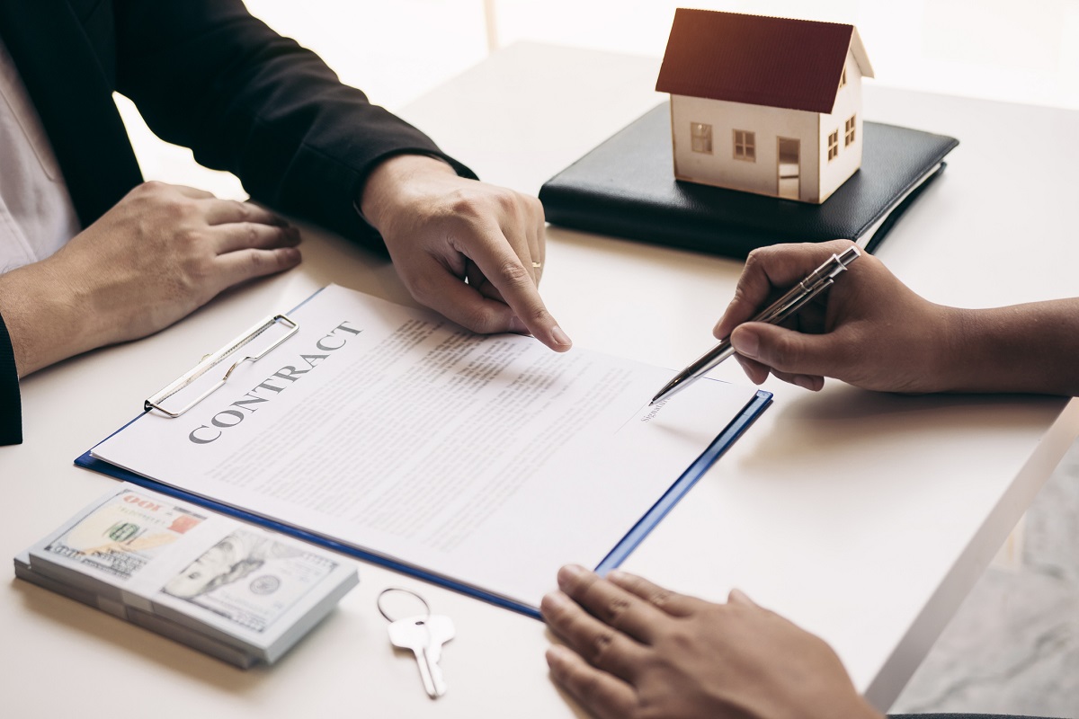 signing a contract on your new home