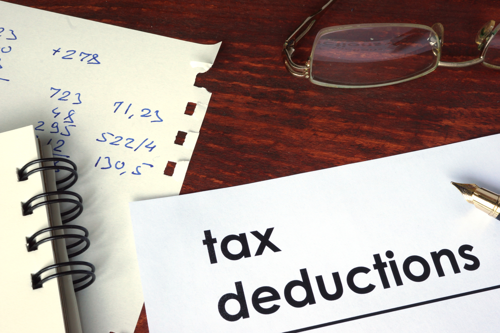 paper with written tax deductions