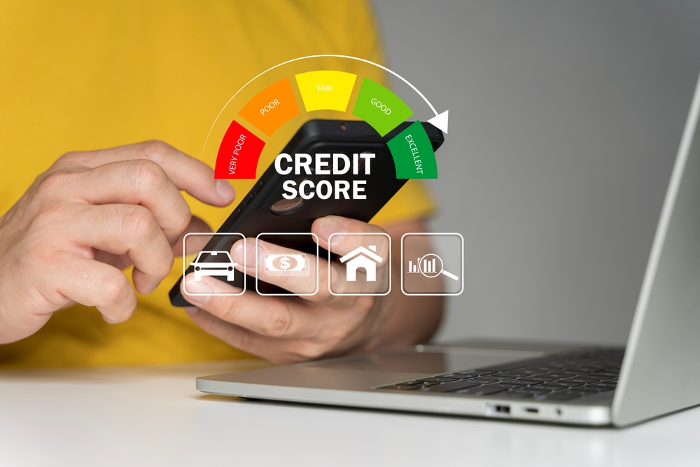 man holding phone with credit-score