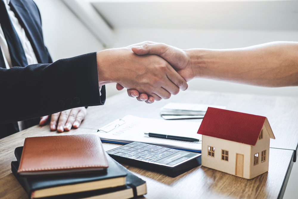 Shaking hands  approve deal  documents