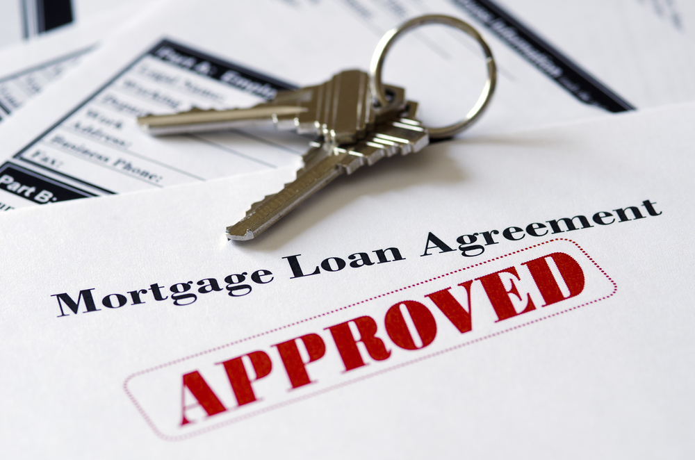 approved mortgage loan agreement with the home keys