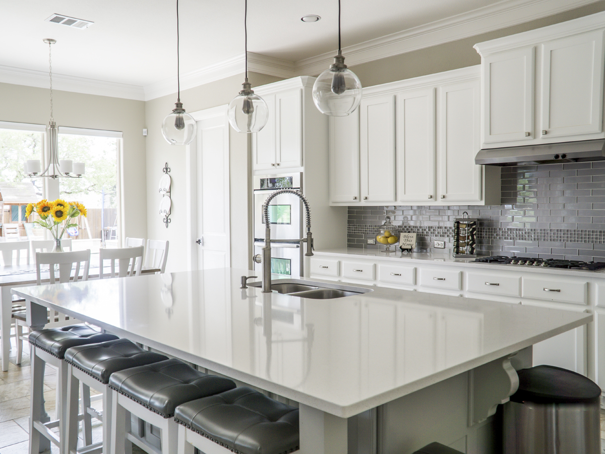 Timeless neutral living room with warm lighting