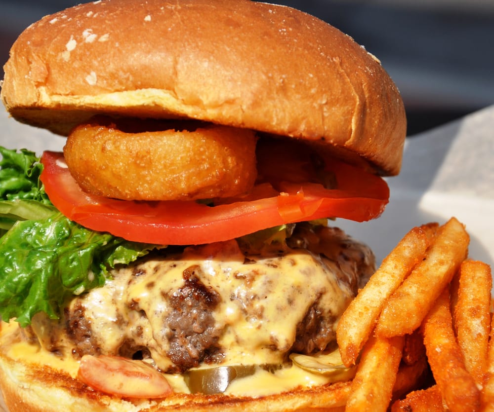Queso Jalapeno Burger topped with a House-made Onion Ring