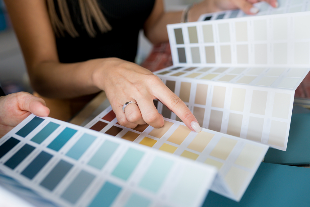 woman choosing color on a color palette