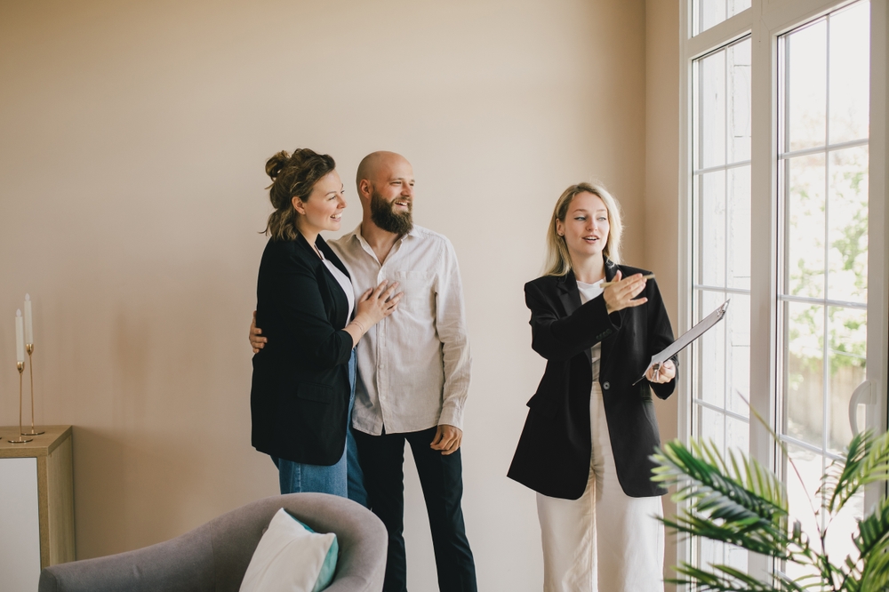 real estate agent showing home to client