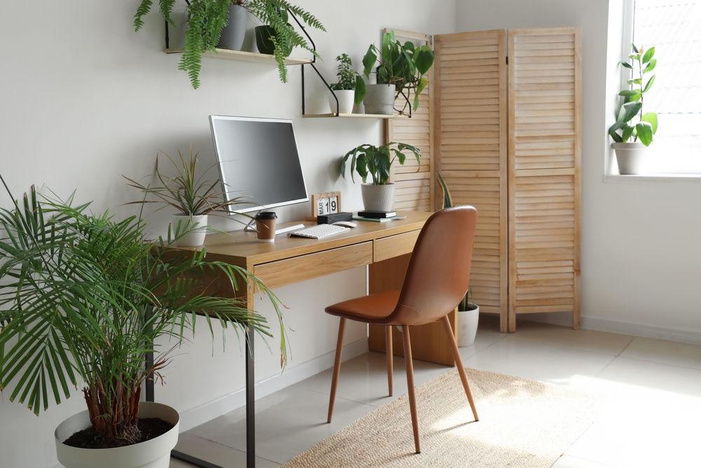 home office space with natural lights and plants