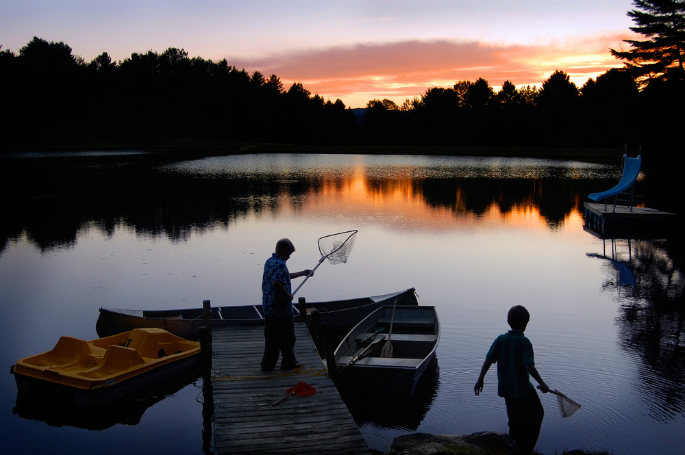 men fishing in Vermont pond