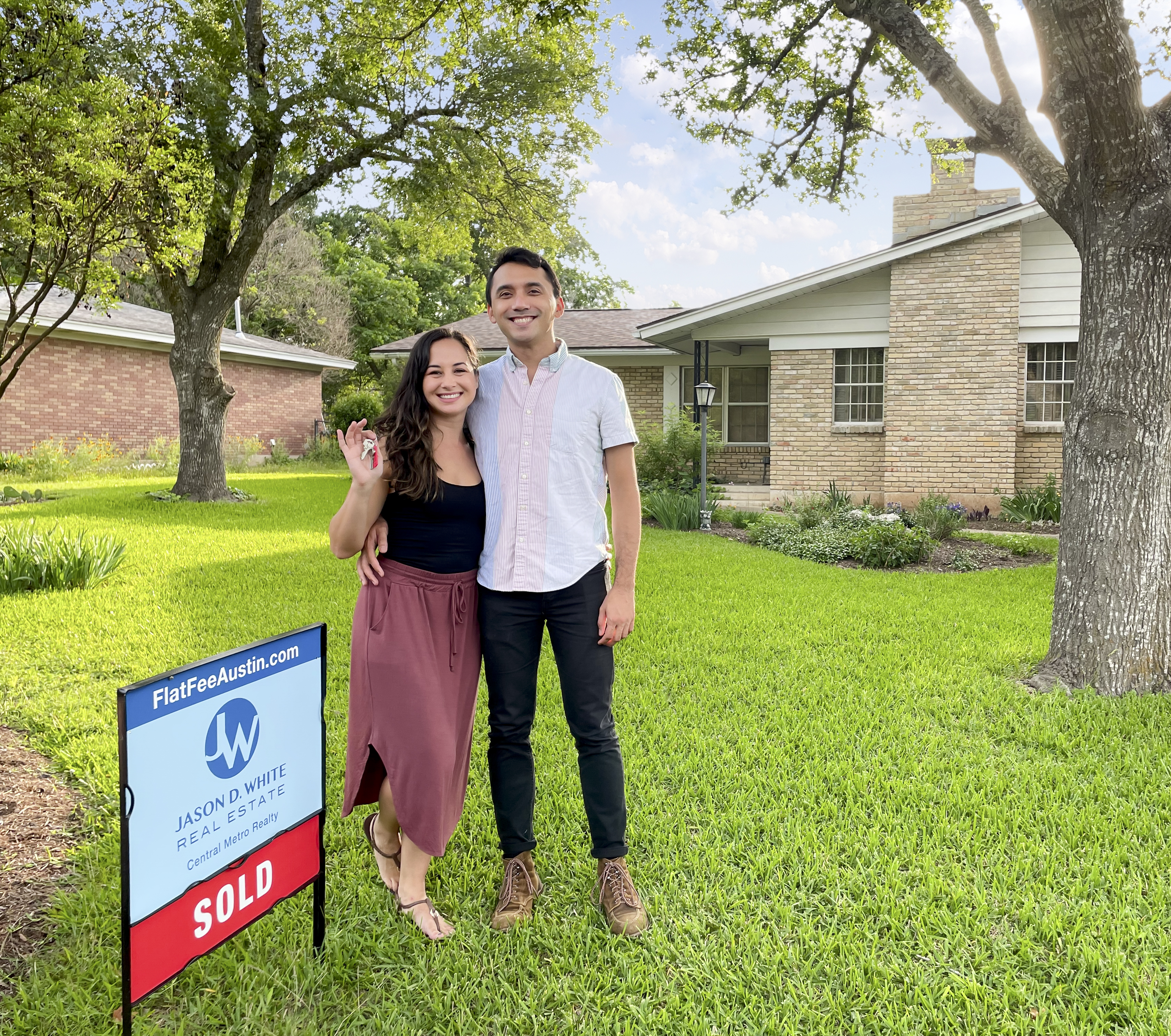 Image of happy home buyers from home for sale in Austin TX