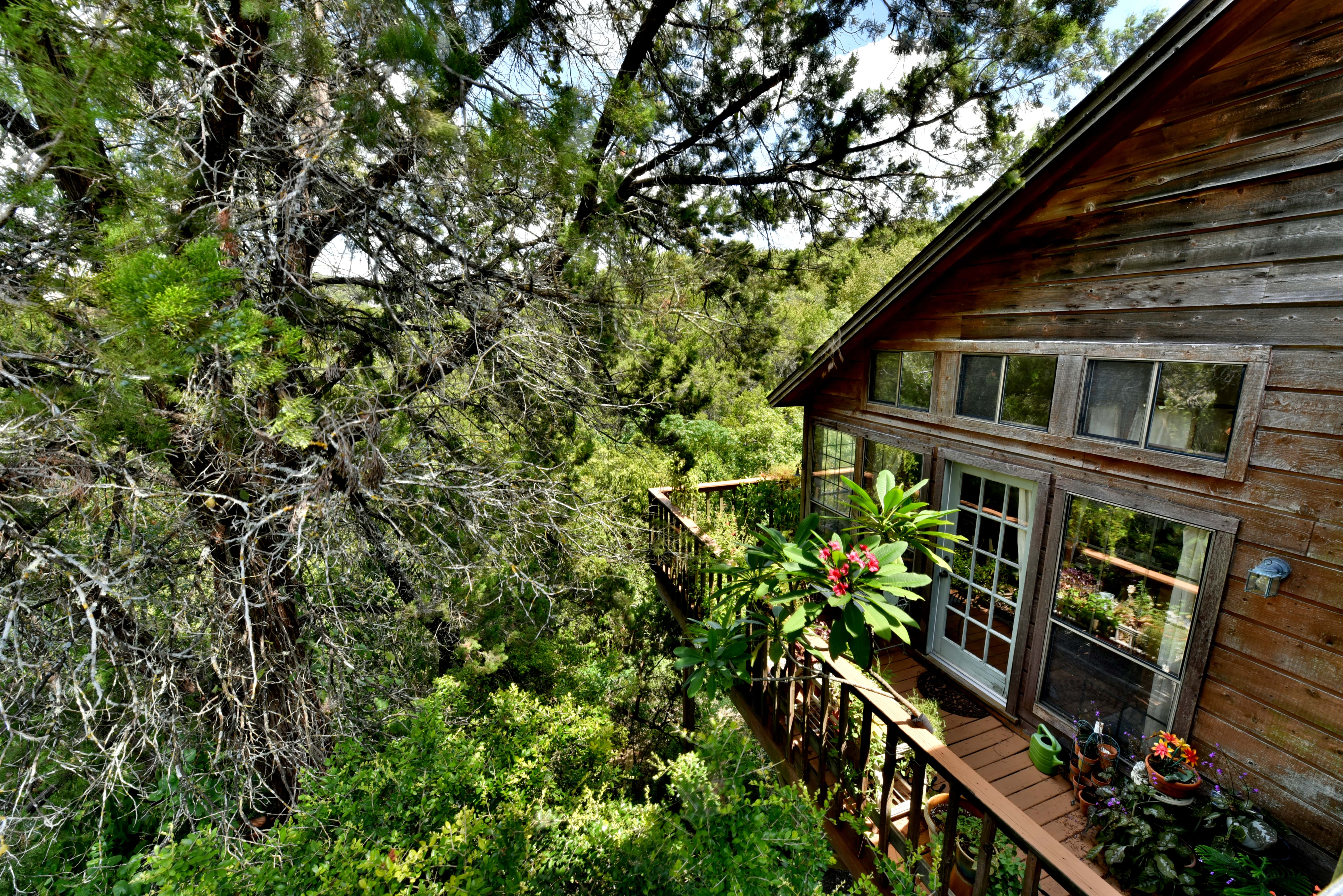 image of west austin home with deck listed for sale