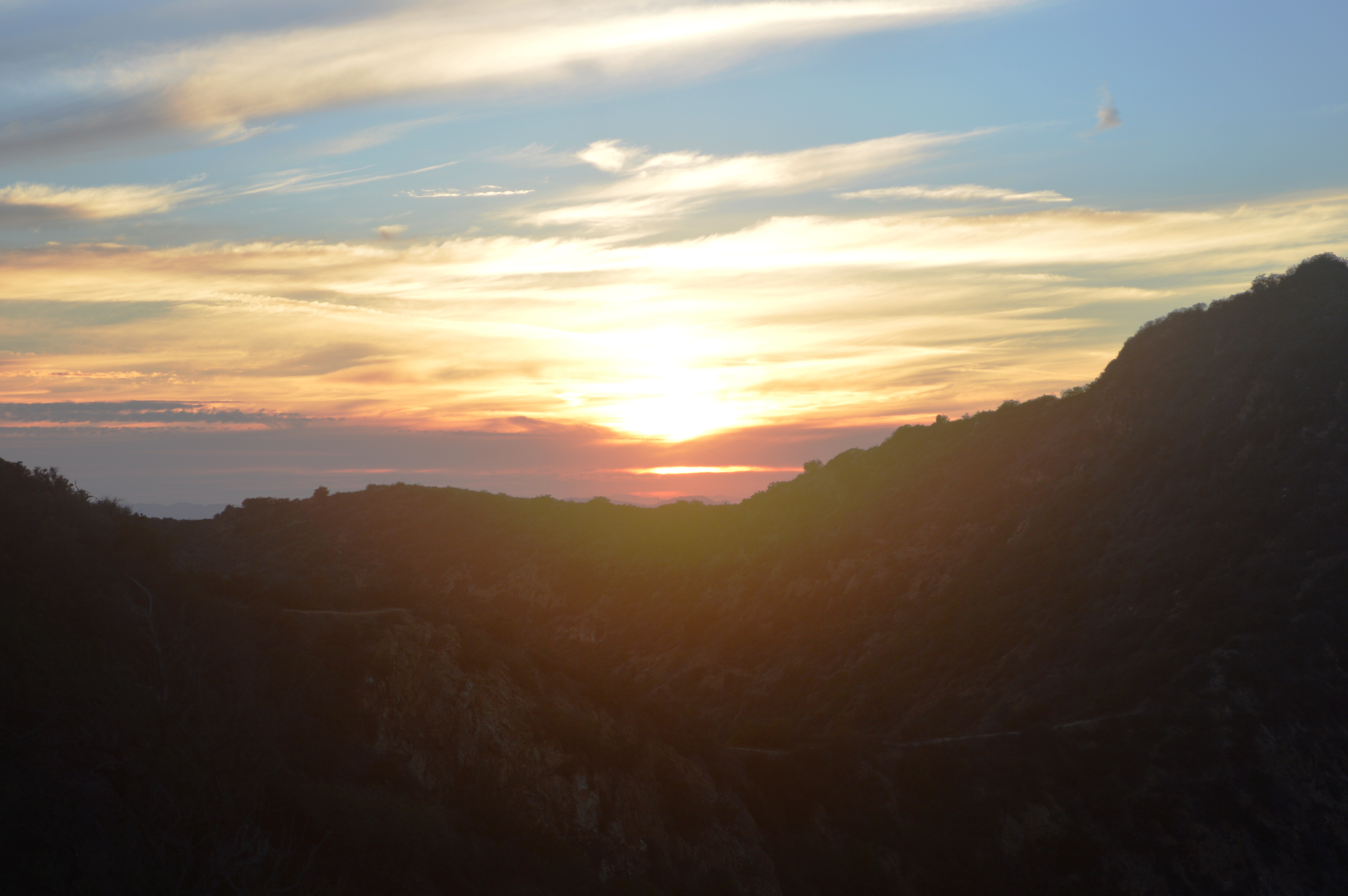 The Bird Streets are ultimately a lesson in scarcity: limited hillside land, irreplaceable views and proximity to the center of LA’s entertainment world. Sunset over the Hollywood Hills near the Bird Streets in Los Angeles.