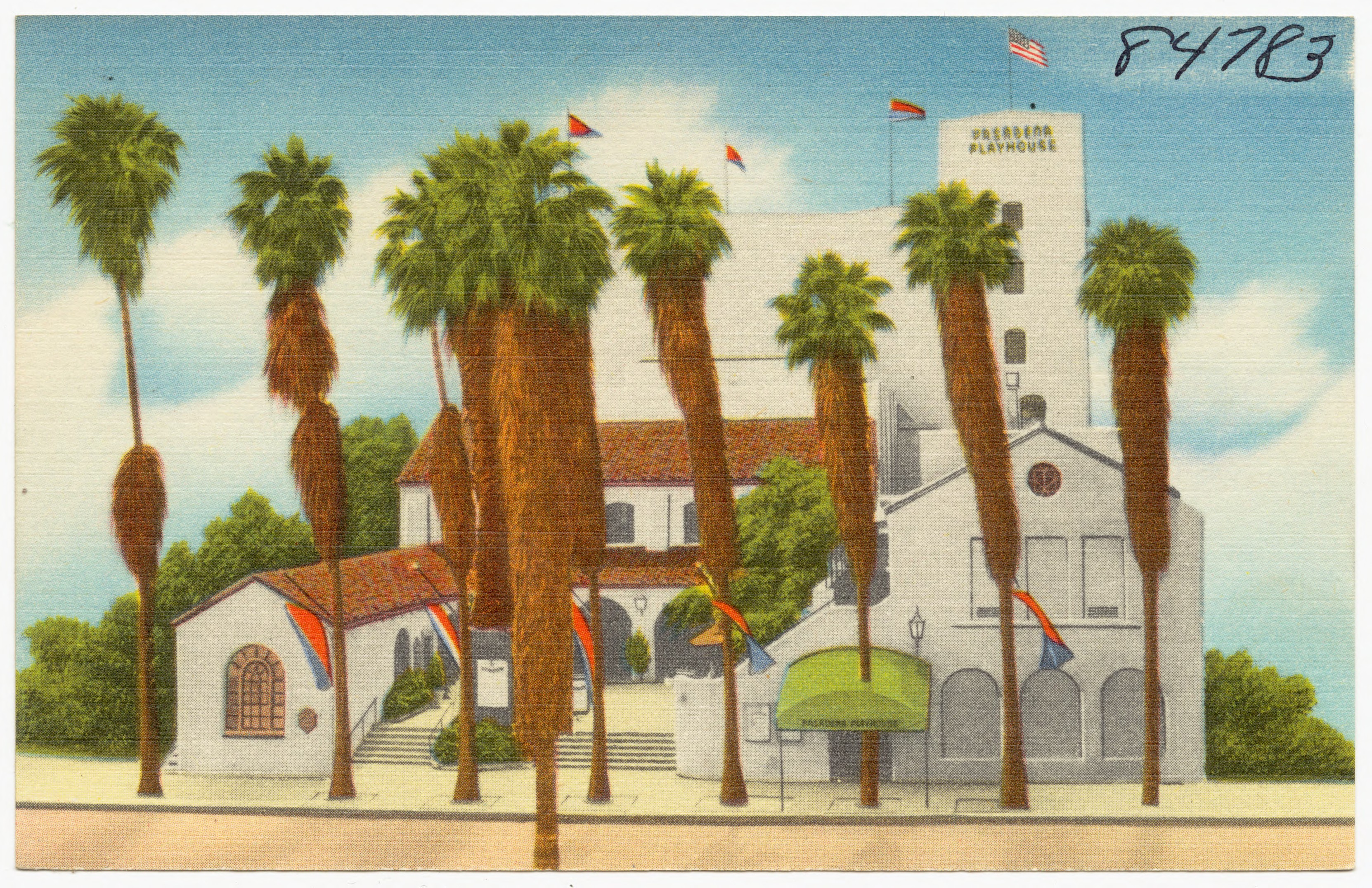 Vintage postcard of the Pasadena Playhouse with palm trees, Spanish-style architecture and the Playhouse tower visible above the building.