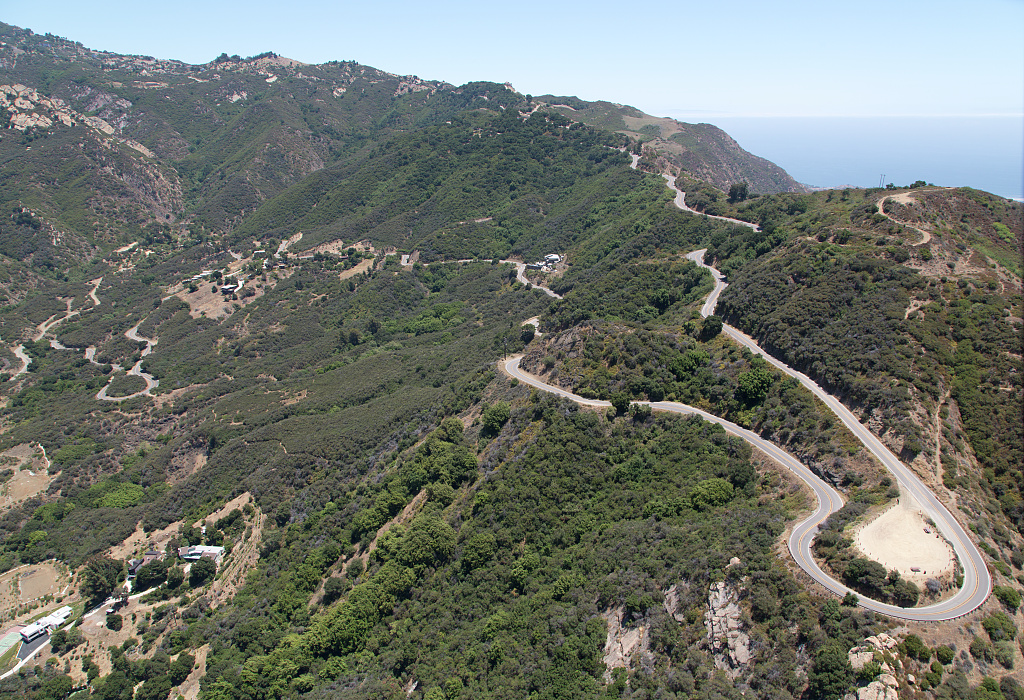 Aerial view of Mulholland Drive winding through the Santa Monica Mountains in Los Angeles.