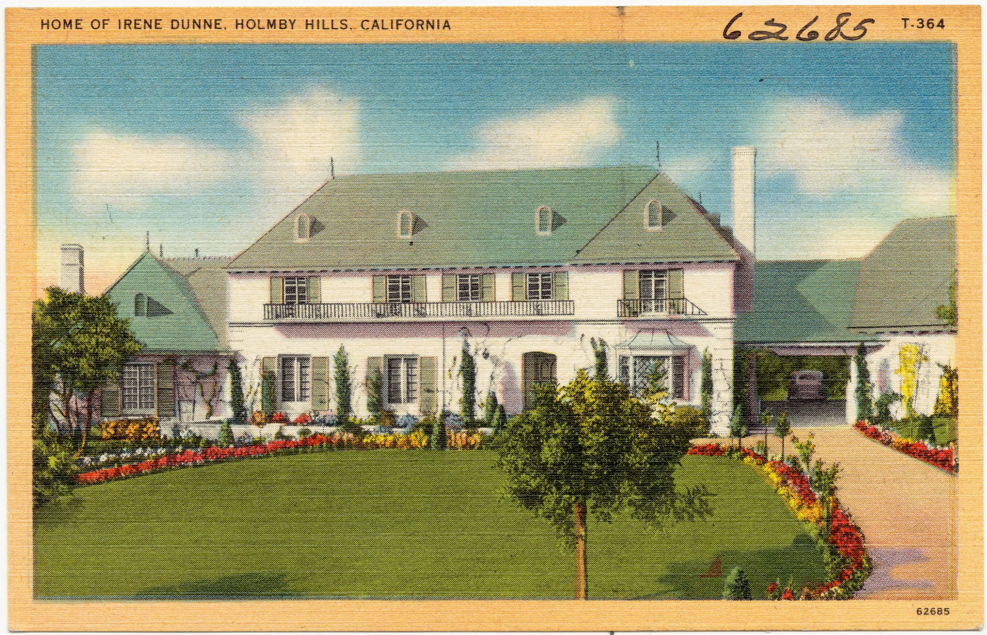Vintage postcard of Irene Dunne’s Holmby Hills home with lawn and formal garden.