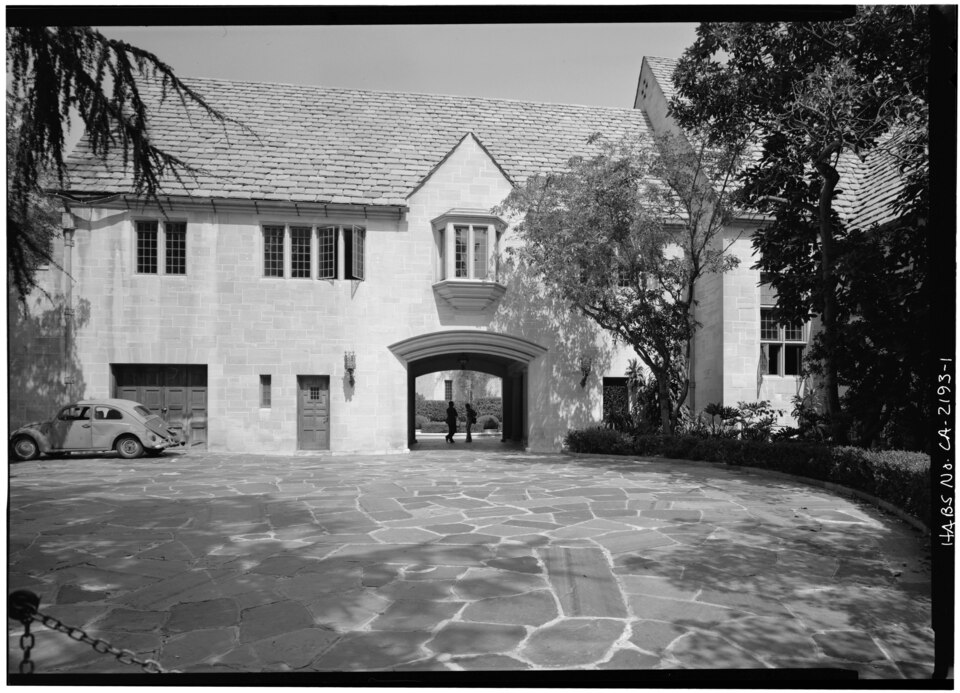 Historic Greystone Mansion in Beverly Hills with formal gardens and pathways.