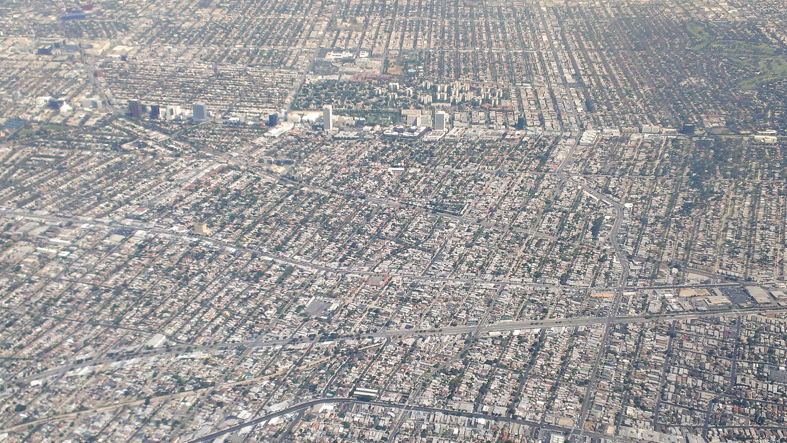 Aerial view of the Wilshire Corridor and nearby Westside neighborhoods in Los Angeles.