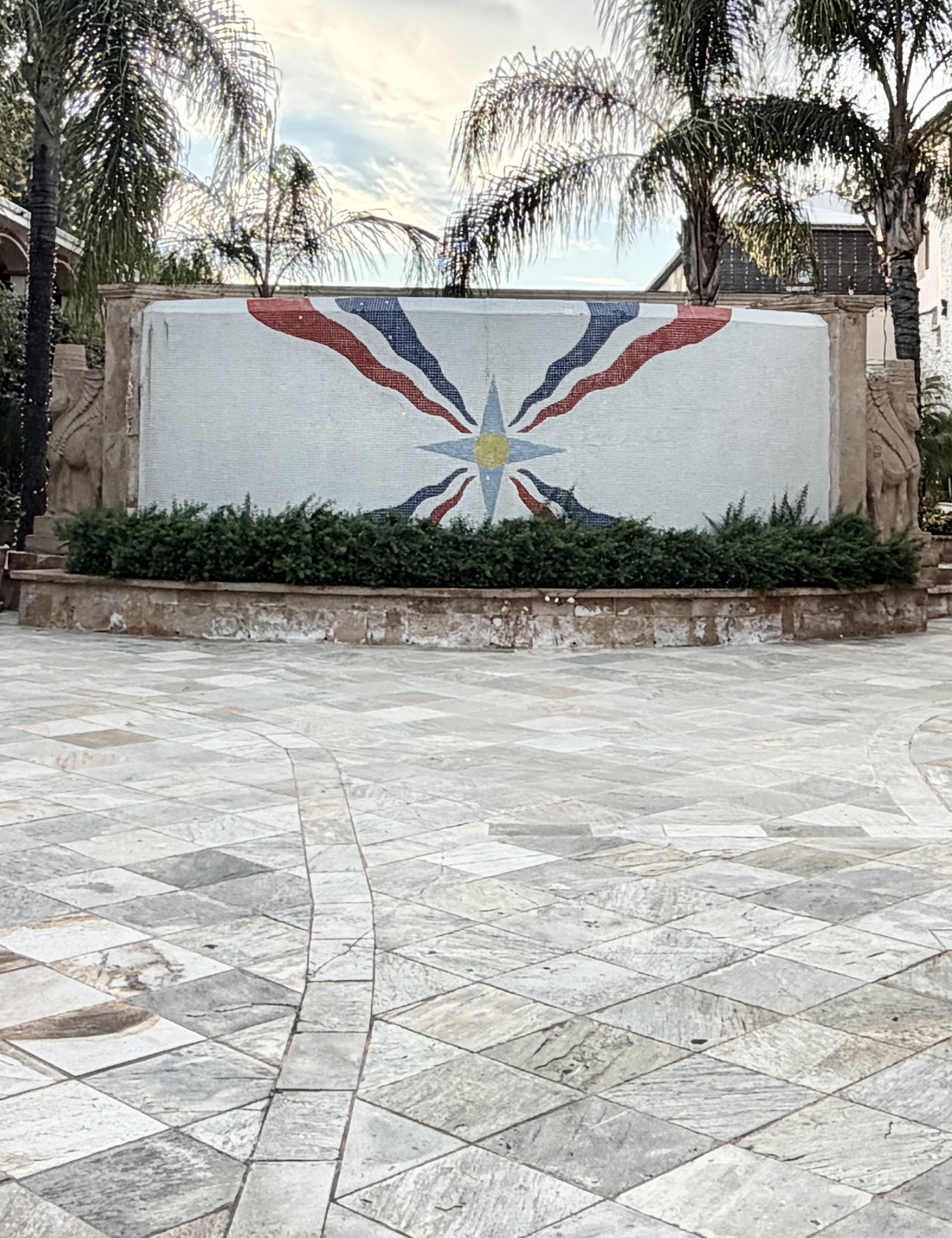 Cultural and religious landmarks in Tarzana. Assyrian Genocide Memorial in Tarzana with a painted mural and stone courtyard.