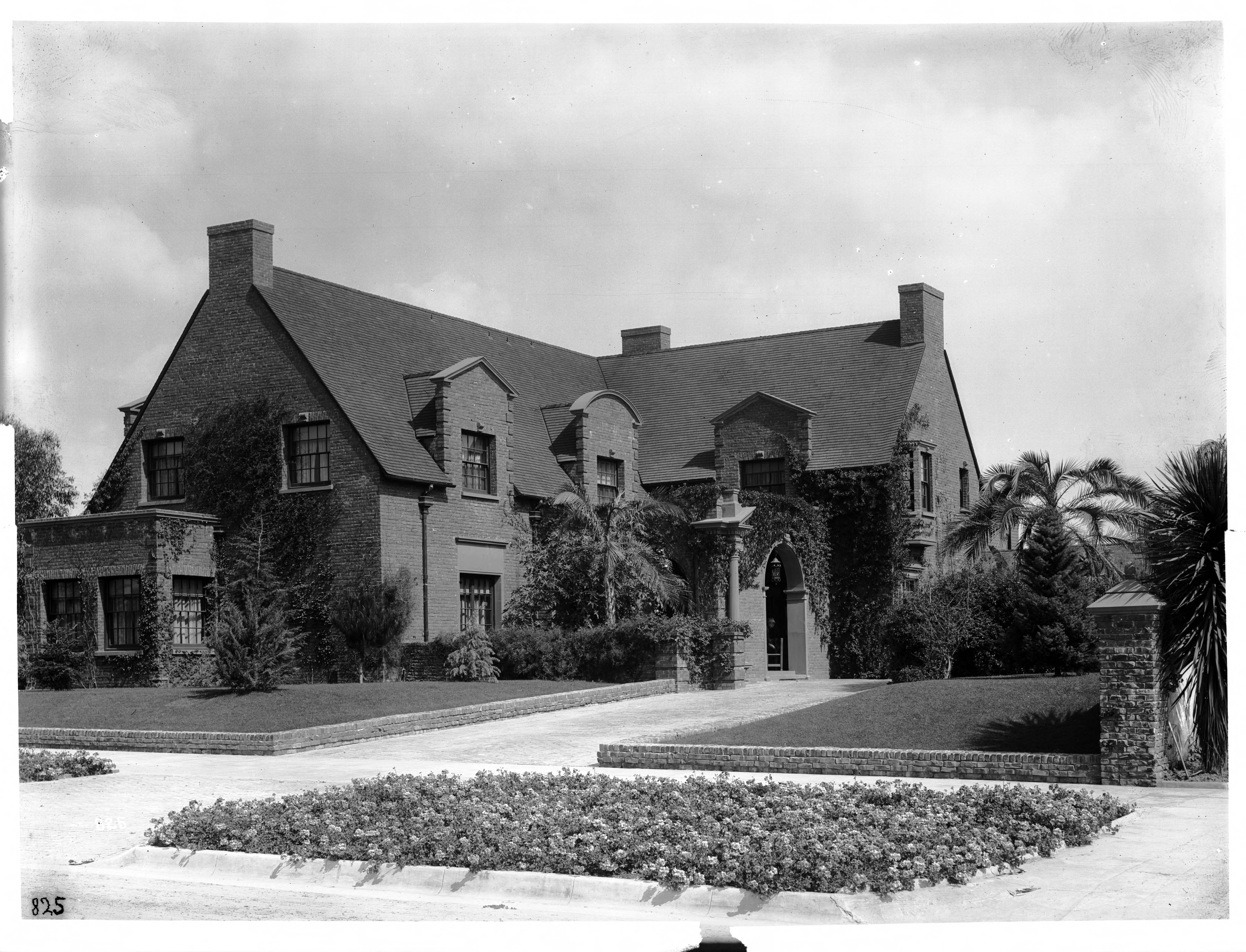 Historic black-and-white image of a large early 20th-century residence in the Westwood area.