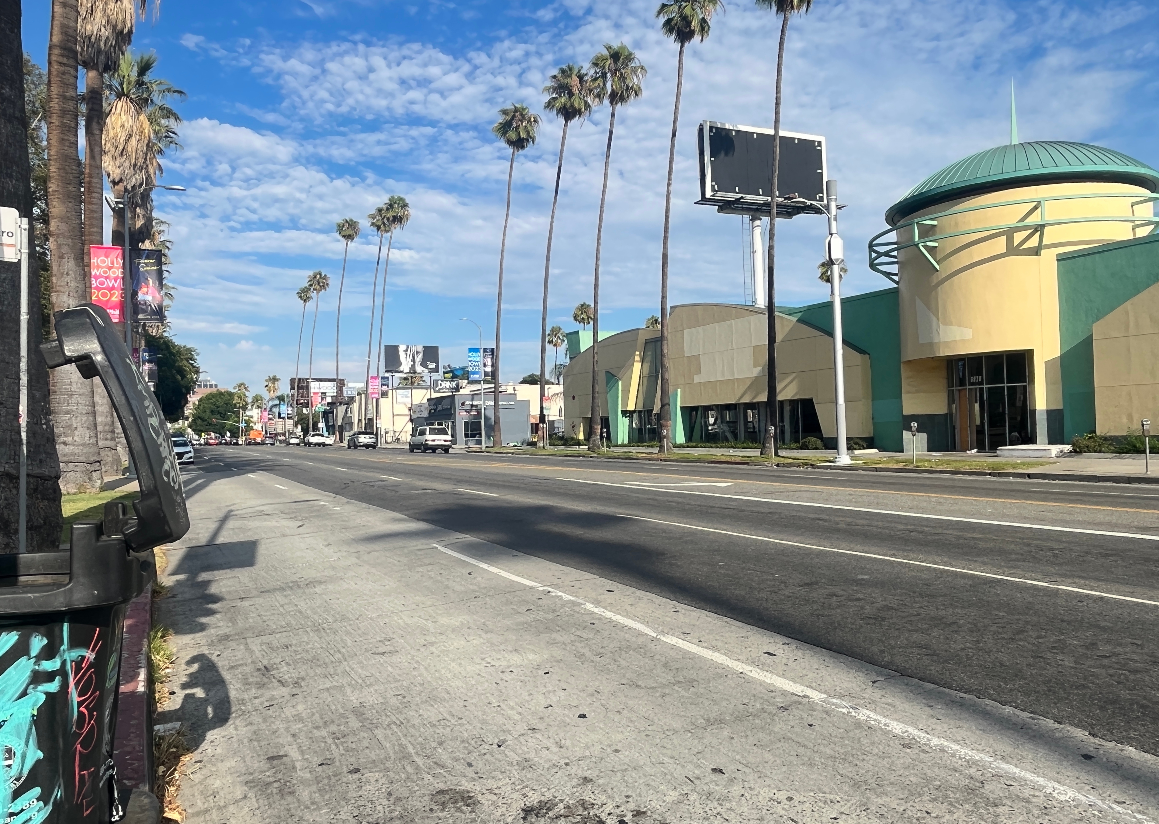 Sunset Boulevard on the Sunset Strip with palm trees and entertainment venues.