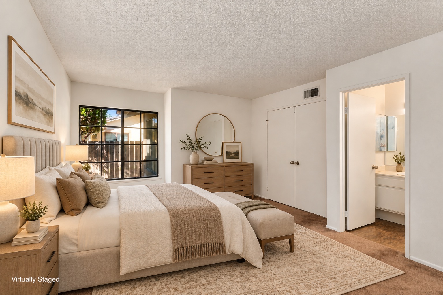 Virtually staged primary bedroom at 26120 Galvez Ct, Santa Clarita, CA 91355, featuring an ensuite bathroom and large closet. Single story 3-bedroom home listed at $635,000 in Valencia by The Kathy Watterson Team at RE/MAX of Santa Clarita.