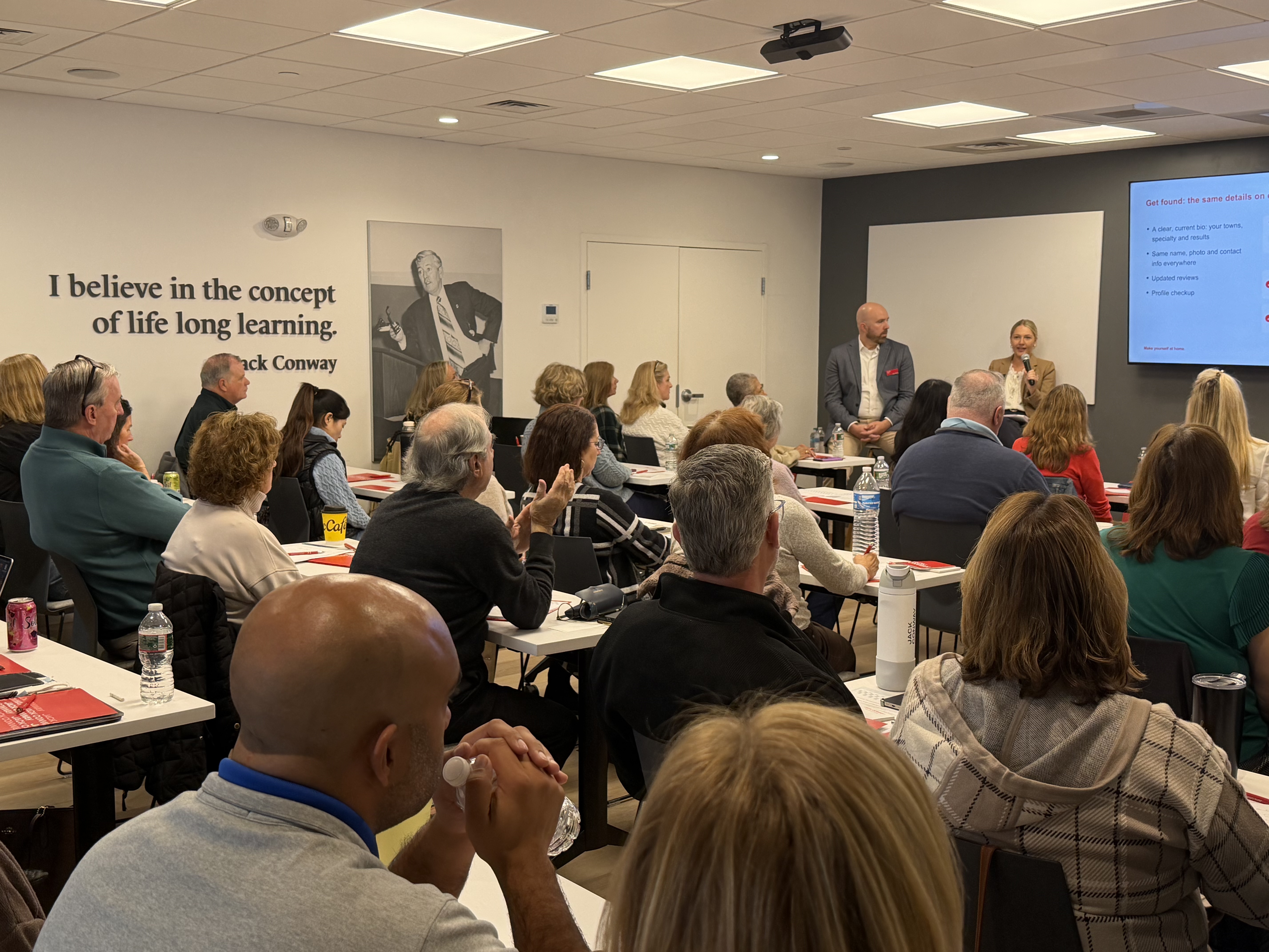 Real estate professionals attending AI Essentials for Real Estate Professionals at Jack Conway's Hanover headquarters