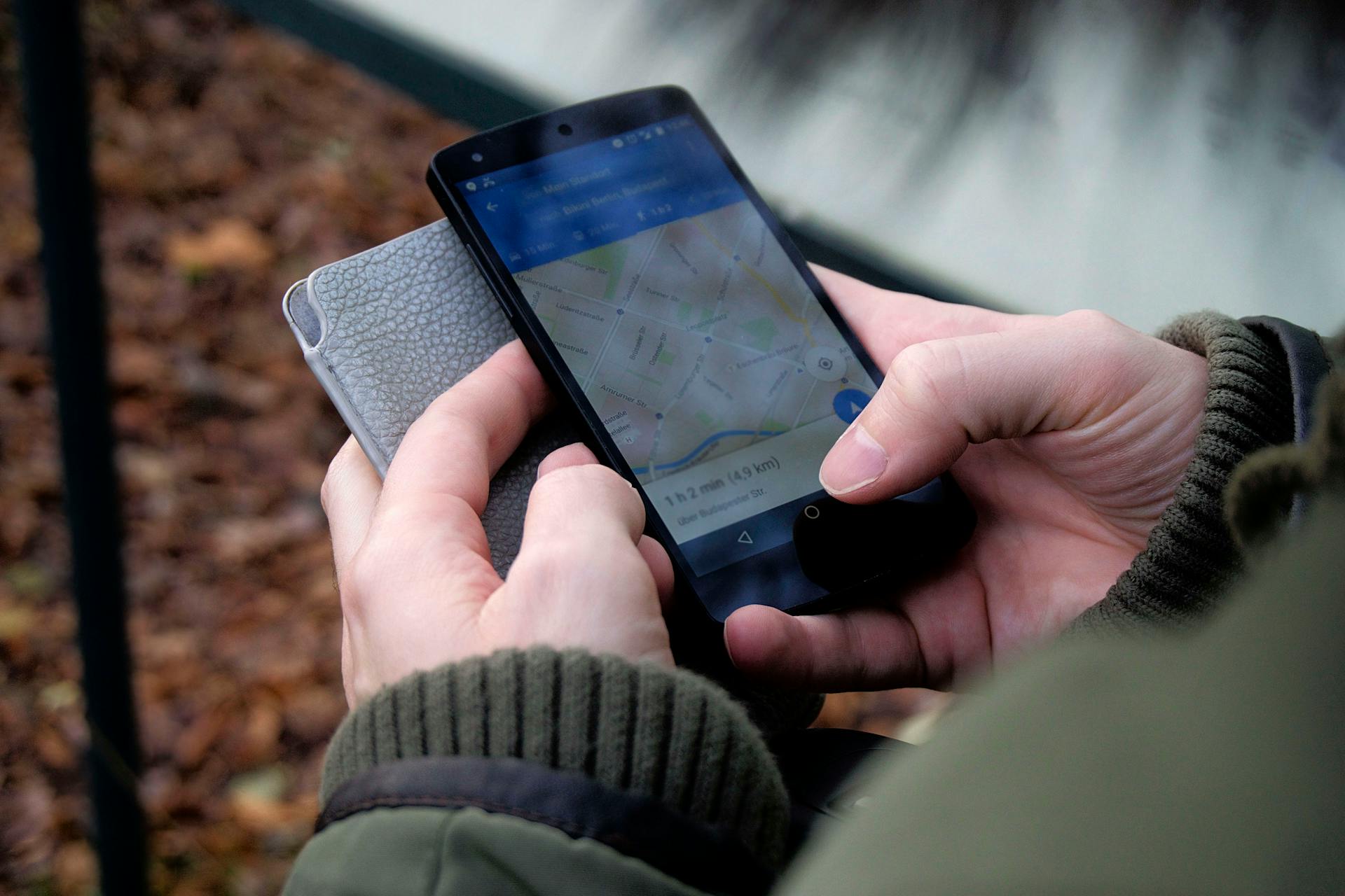 A man using Google Maps on his phone