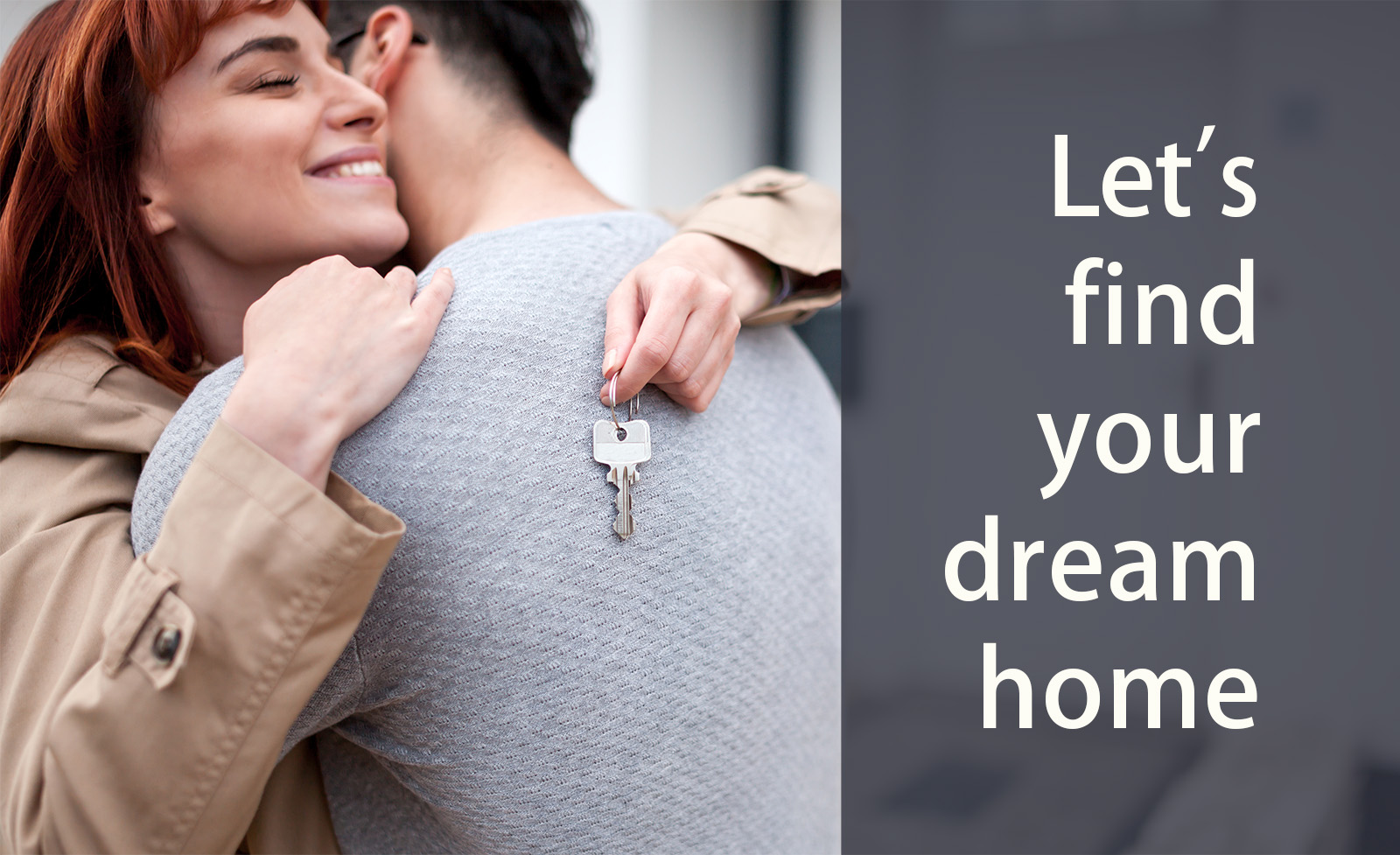 couple with new house keys hugging