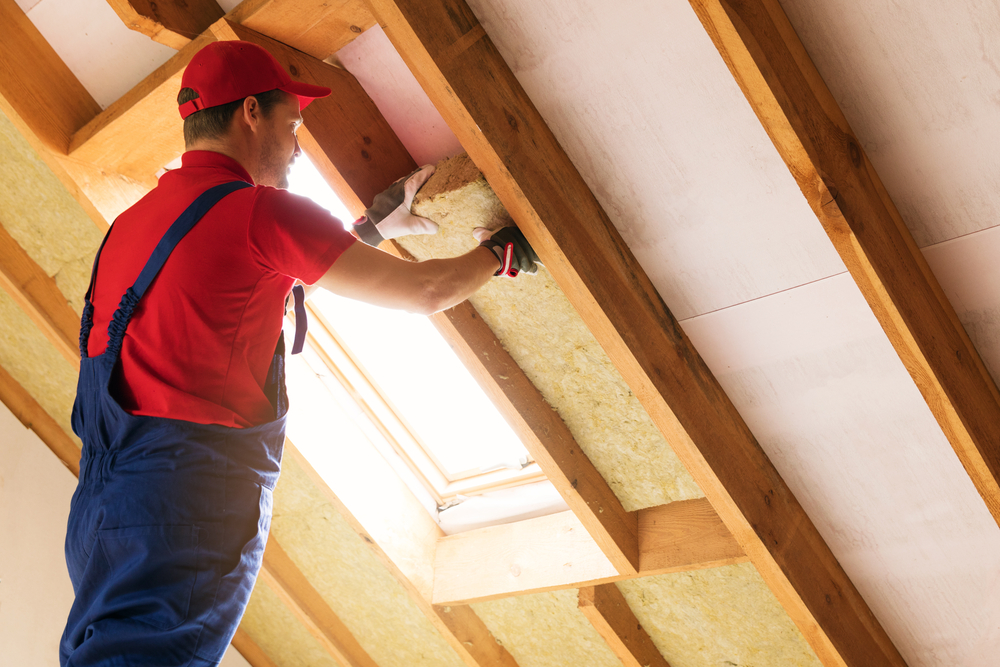 Installing insulation on the attic