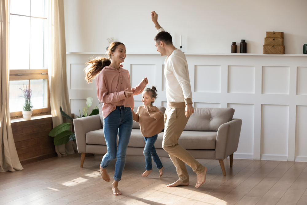 Family Dancing In The Living Room